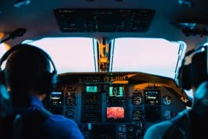 plane cockpit with 2 men
